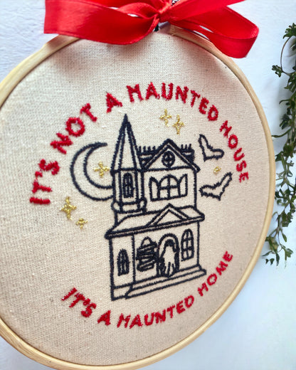 It's not a Haunted House, It's a Haunted Home Embroidered Wall Art