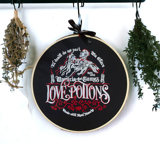 Love Potion Adams Embroidered Wall Art